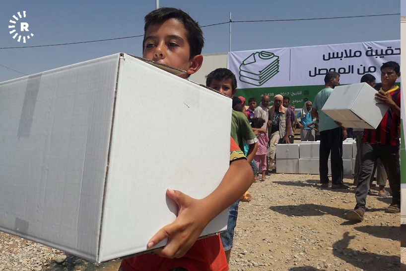 دابەشکردنی جلوبەرگ بەسەر ئاوارەکانی موسڵ