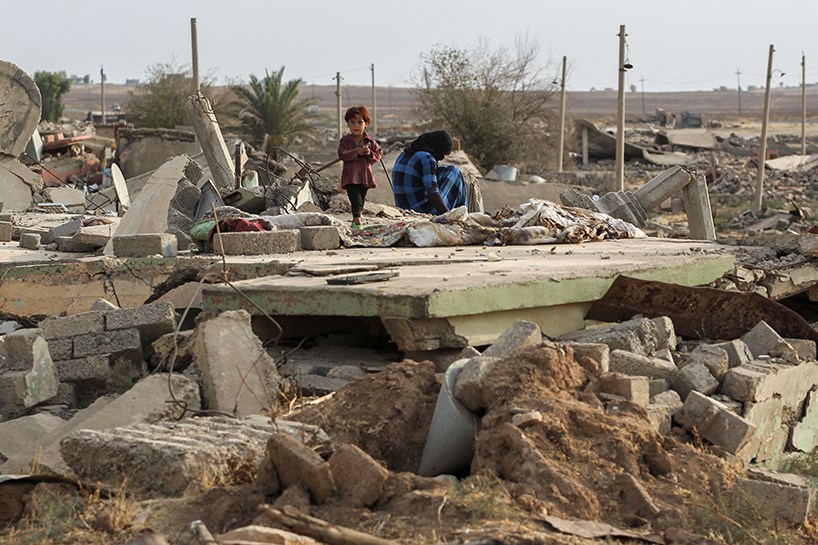 The destroyed homes of the Iraqi attack on Zummar