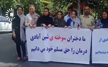 Burned Kurdish schoolgirls stage demo outside Rouhani’s office
