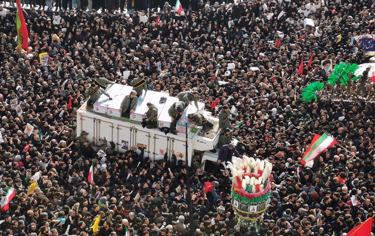 Mourners gather to pay homage to top Iranian military commander Qasem Soleimani in Tehran on January 6, 2020. Photo: Atta Kenare / AFP