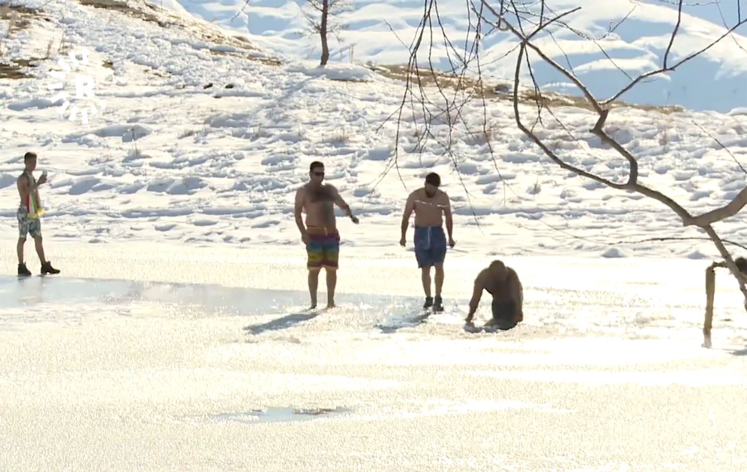 Young Kurds take a bracing dip in Choman's ice-cold waters