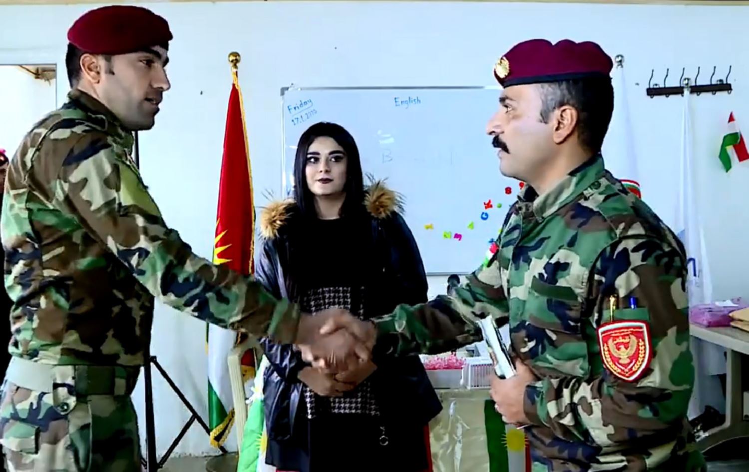 Peshmerga fighters receive English language certificates in Dohuk