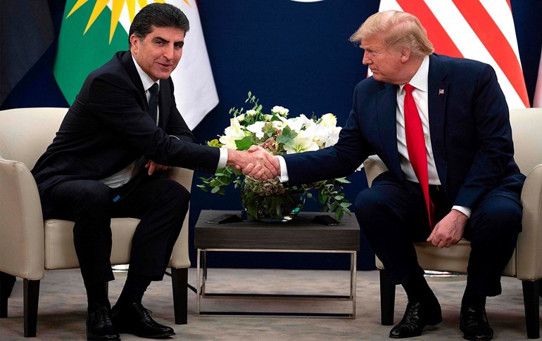 Serokê Herêma Kurdistanê Nêçîrvan Barzanî û Serokê Amerîkayê Donald Trump îro Çarşemê 22ê Çileya 2020 li Davosê civiyan. Wêne: AFP