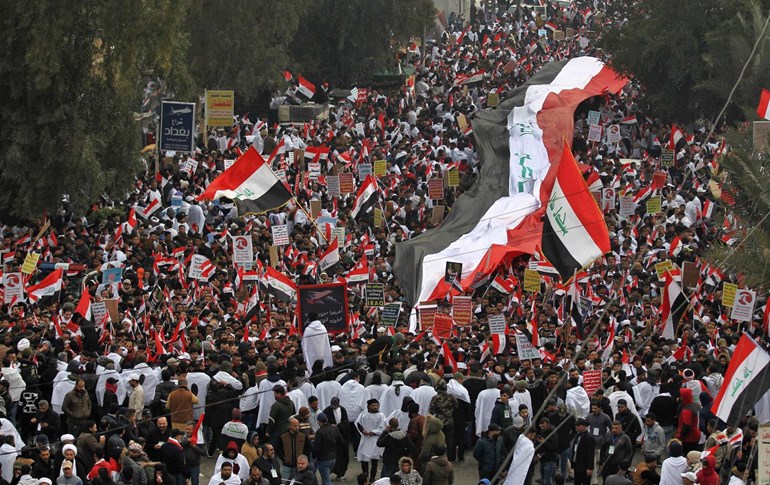 بەڕێوەچوونی خۆپیشاندان لە بەغدا. وێنە: AFP