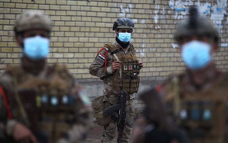 Iraqi soldiers deploy in the streets of Baghdad to enforce the lockdown, March 18, 2020. Photo: Ahmad al-Rubaye / AFP