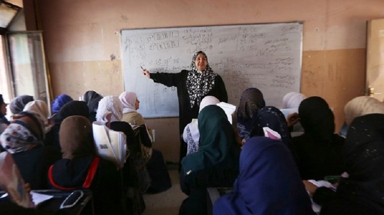 File photo of Iraqi girls attend a class at a school in west Mosul on July 27, 2017. Photo: Safin Hamed/ AFP