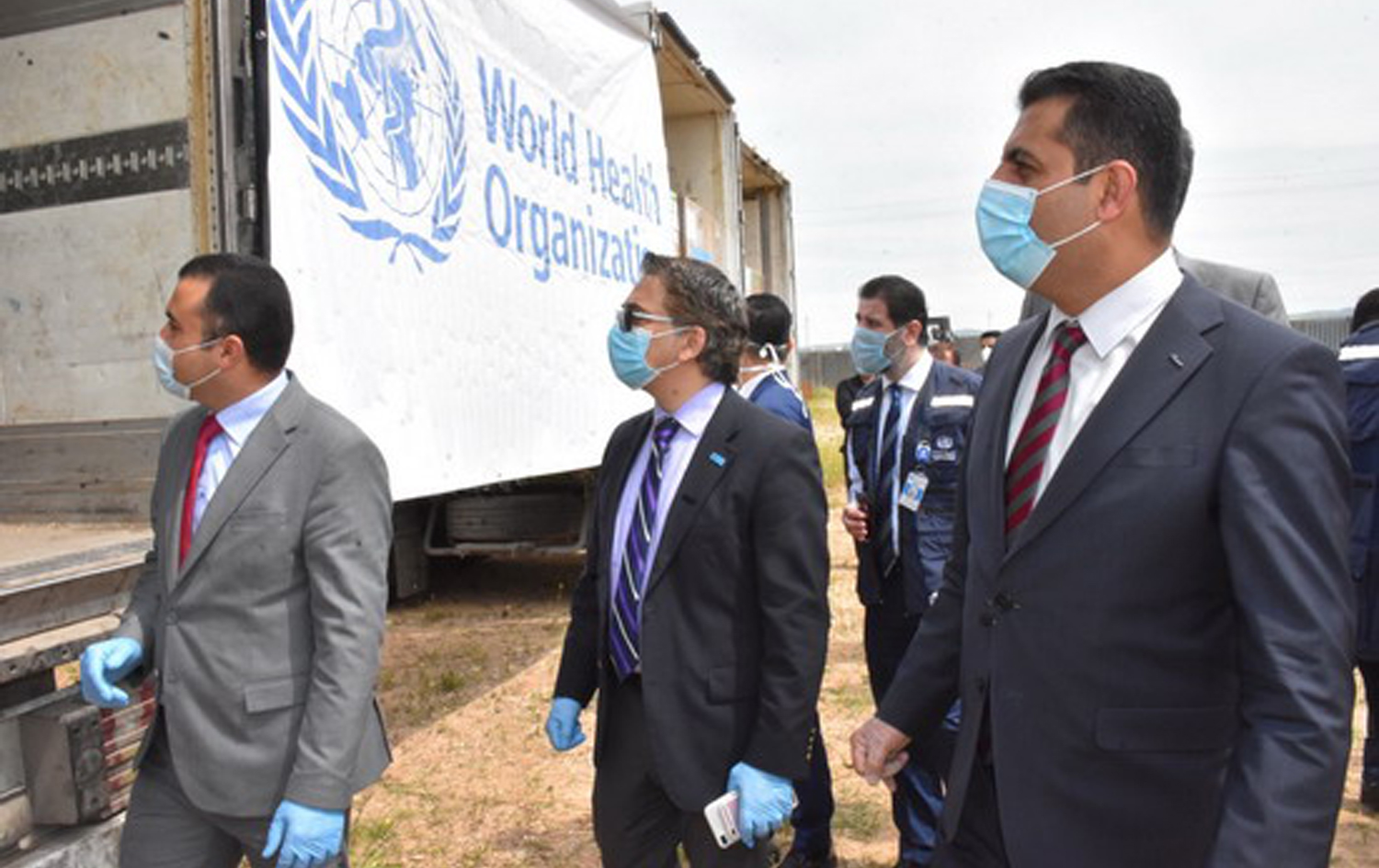 Kurdish officials accept delivery of WHO medical supplies, April 19, 2020. Photo: WHO Iraq