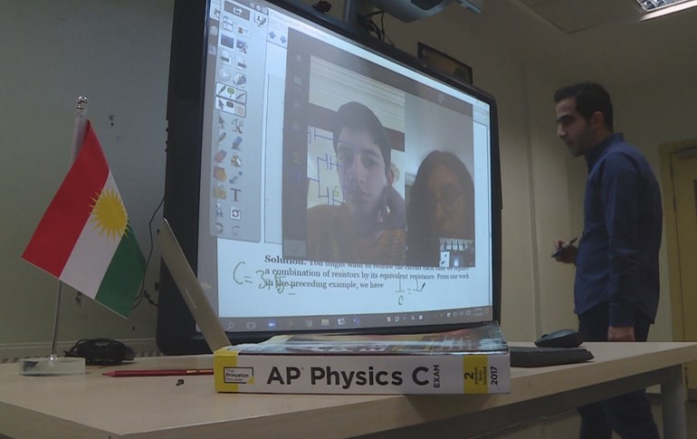 A teacher at a Kurdistan Region private school speaks with students online during COVID-19 lockdown. Photo: Rudaw