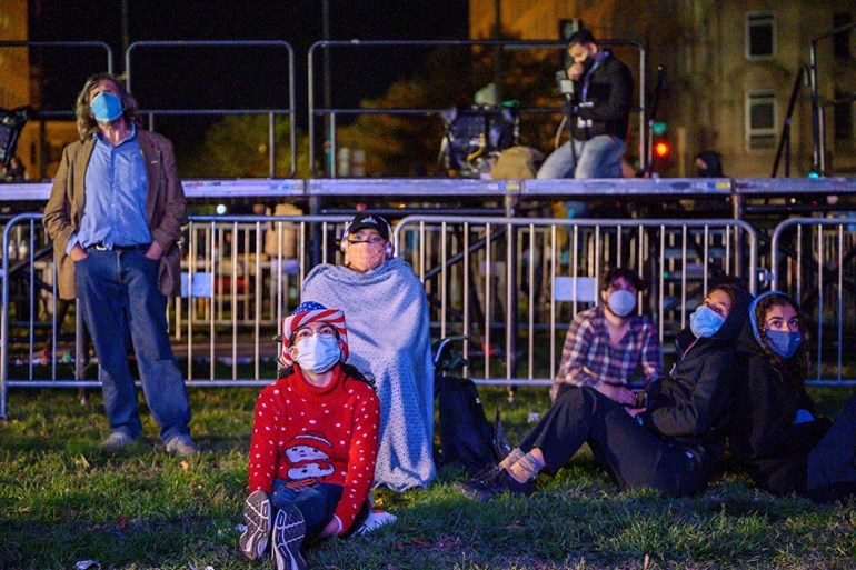 Supporters of Democratic presidential nominee Joe Biden worry as they watch the election results unfold on a giant screen in a square near the White House on November 3, 2020 in Washington, DC. Eric Baradat / AFP