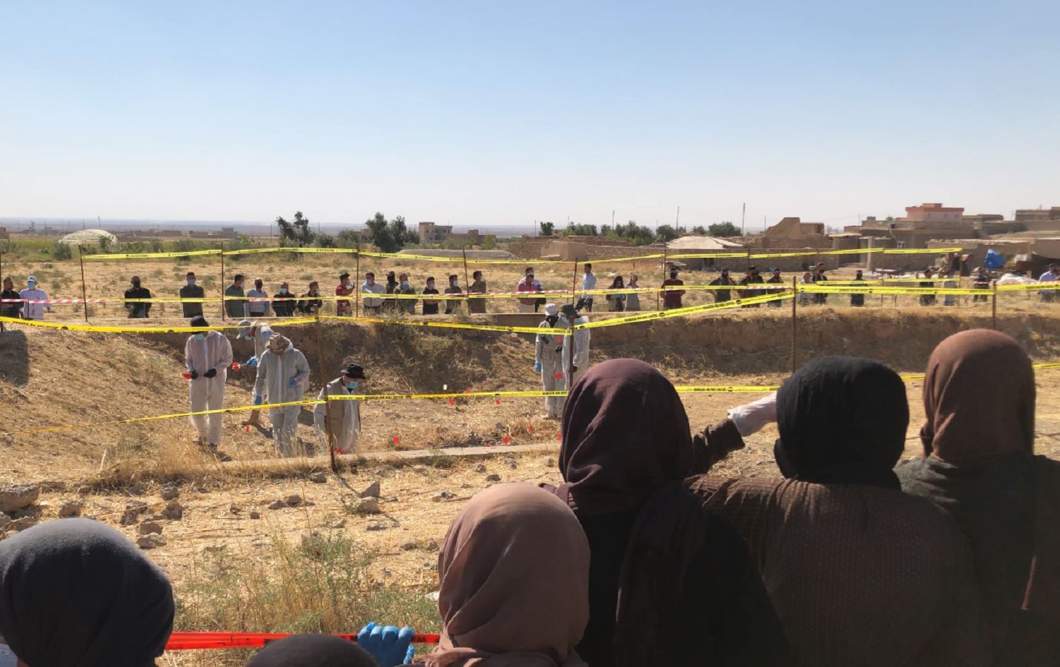 Yazidi mass grave exhumations: To lift then lay to rest
