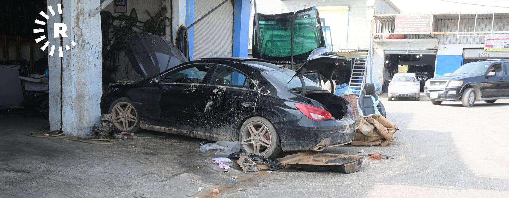 FOTO - Erbil’de selzedeler araçlarını tamir ettiriyor