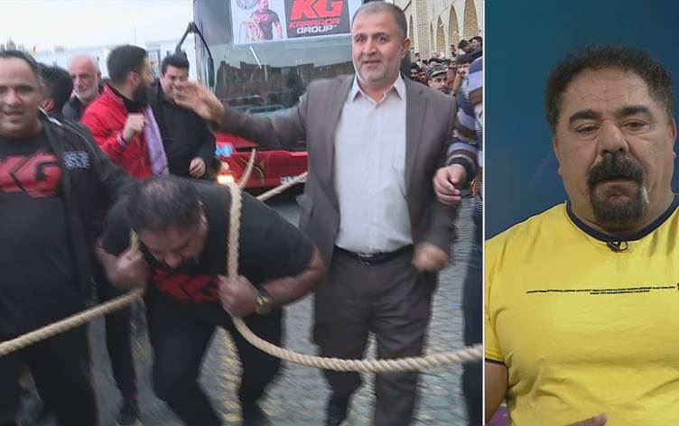 Kürt sporcu 42 tonluk otobüsü halatla çekti