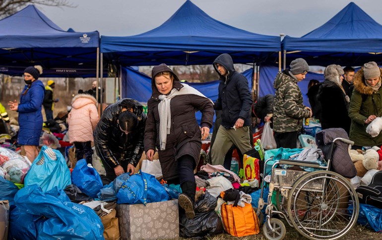 ژمارەیەک ئاوارەی ئۆکراینی. وێنە: AFP