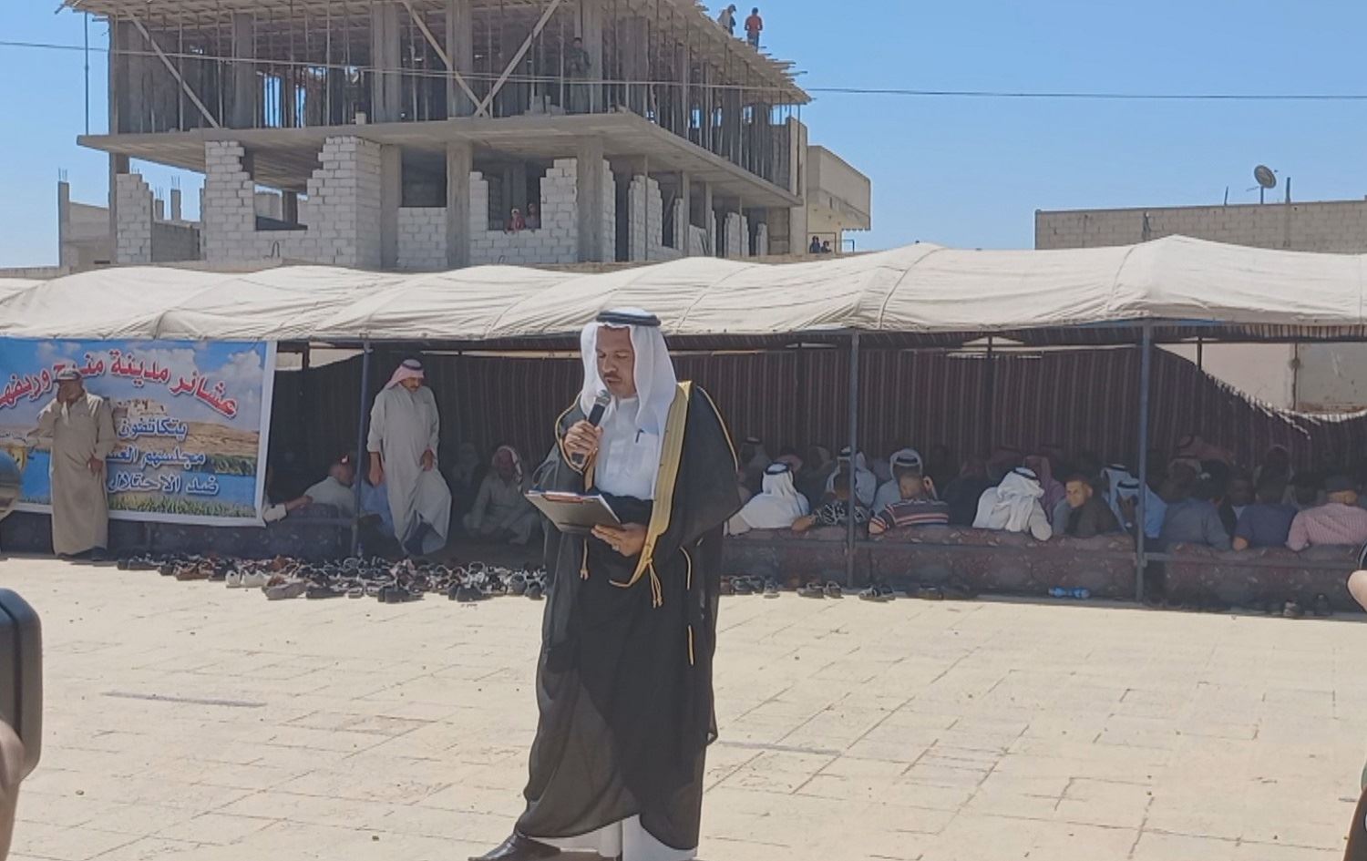 Xelkê Minbic gefên Tirkiyê li ser bajarê xwe şermezar kirin