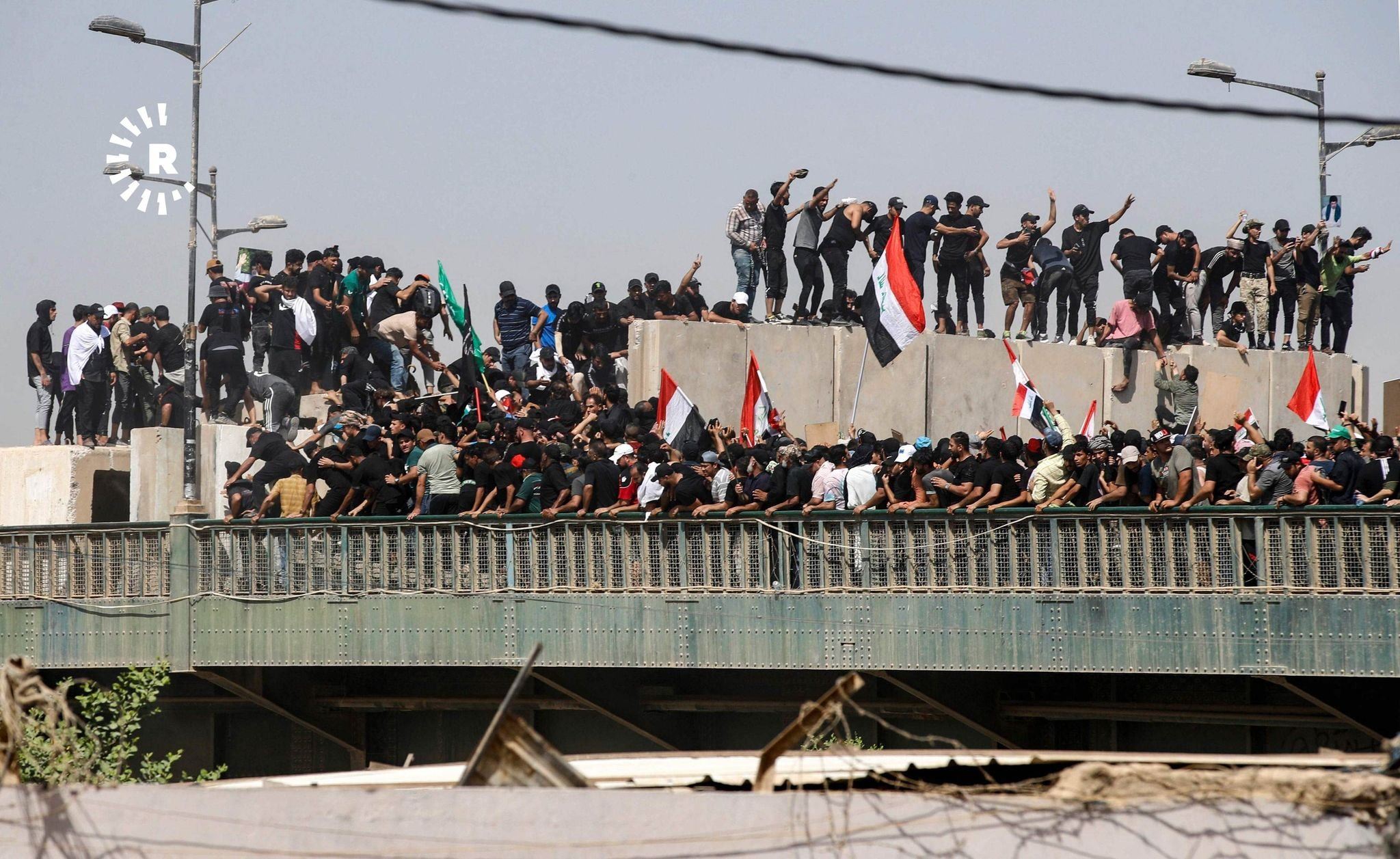   دیمەنێک لە خۆپێشاندانی لایەنگرانی سەدر لە بەغدا 