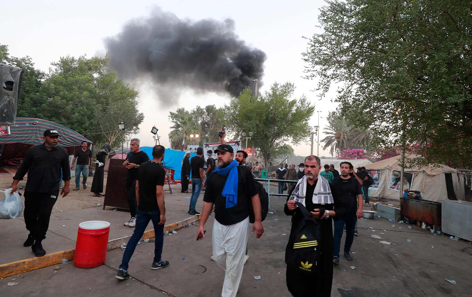 چەند خۆپێشاندەرێک لە بەغدا. وێنە: AFP