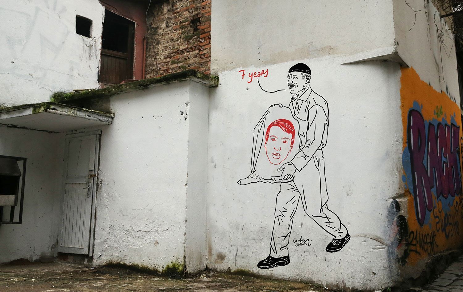 Karîkaturîstê Îtalî: Min tenê dikarî bi vî awayî malbata Hakan Arslan hembêz bikim