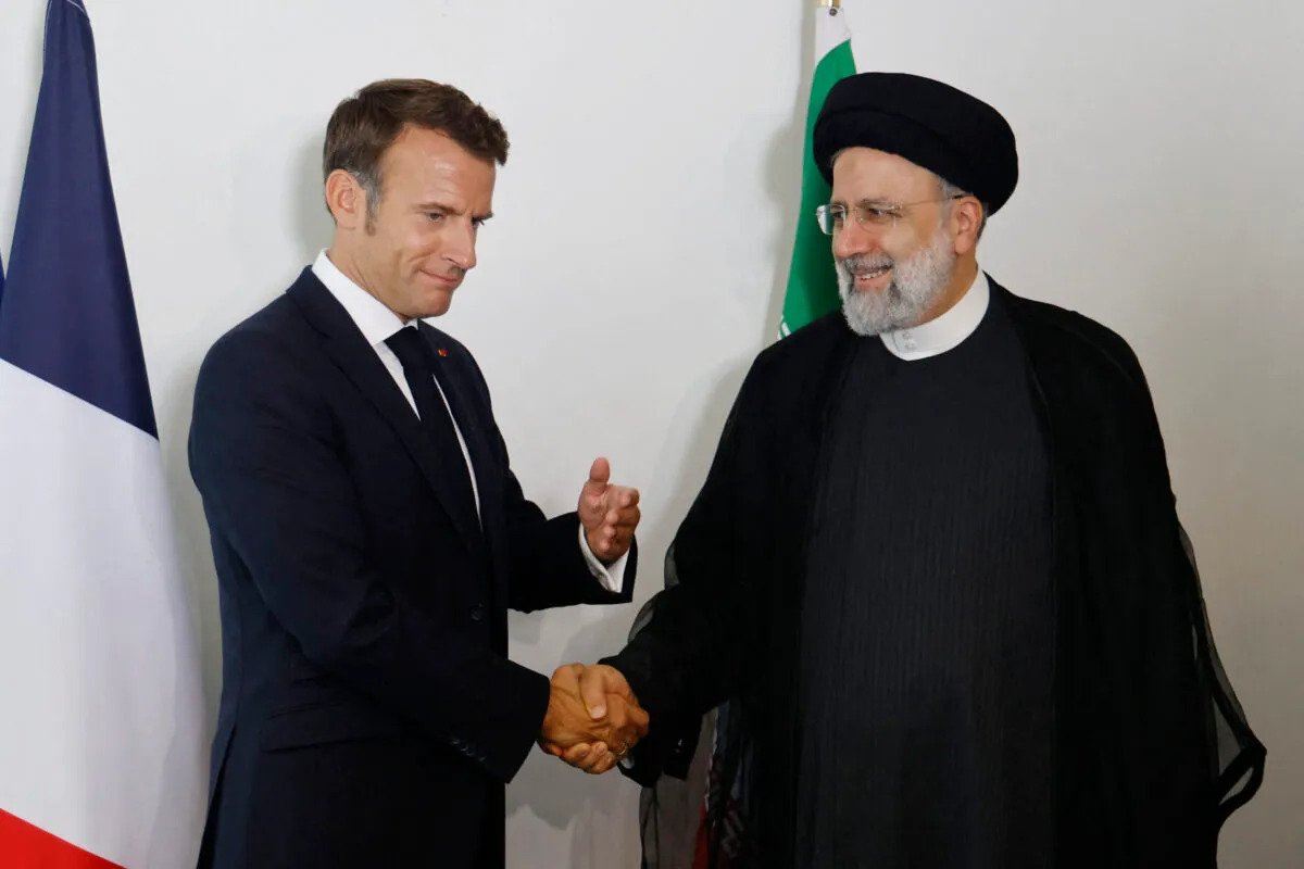 بەشێک لە خەڵکی ئێران رەخنە لە تەوقەکردنی ماکرۆن لەگەڵ رەئیسی دەگرن