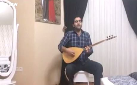 Urmiyeli amatör sanatçı Kobani için söyledi...