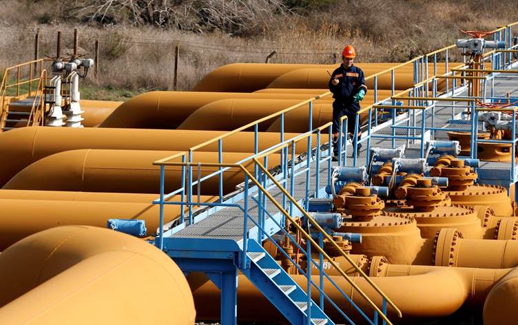 An engineer at the Jayhan port inspects the oil pipelines. Picture: Reuters