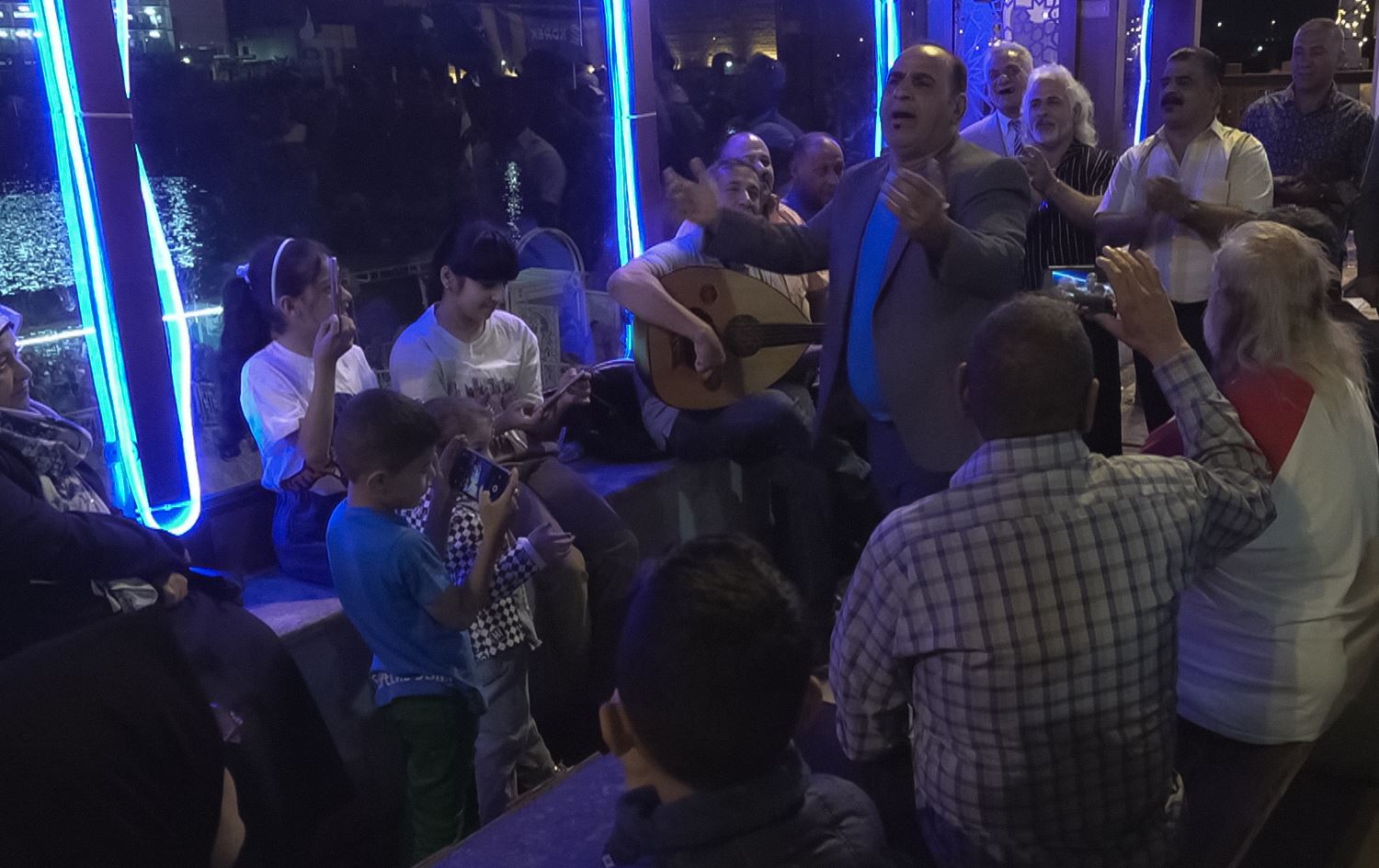 ‘Joyful’ Baghdadis spend Ramadan nights on famed booksellers street