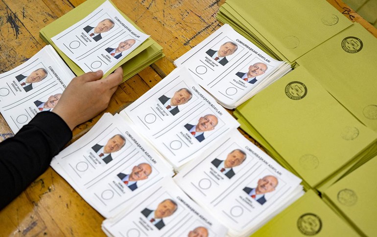 A photograph shows ballots depicting the two candidates, Recep Tayyip Erdogan (L) and Kemal Kilicdaroglu on the day of the Presidential runoff vote in a polling station in a government school in Adana on May 28, 2023. Photo: Yasin Akgul/AFP