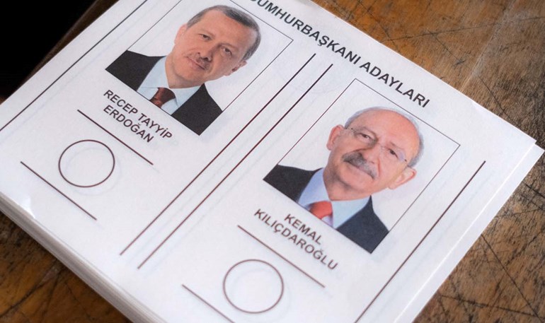 Ballot papers featuring the two candidates Recep Tayyip Erdogan (L) and Kemal Kilicdaroglu are seen in a container acting as a polling station during the presidential runoff vote in the quake-hit city of Kahramanmaras, Turkey, on May 28, 2023. Photo: Can Erok/AFP