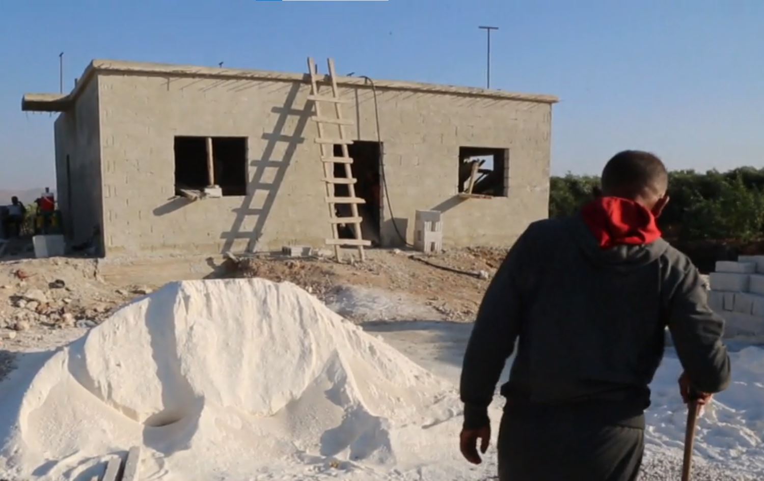 Rêxistina Destî Hawkarî 10 xaniyan ji bo ziyandîtiyên erdheja Cindirêsê lê dike