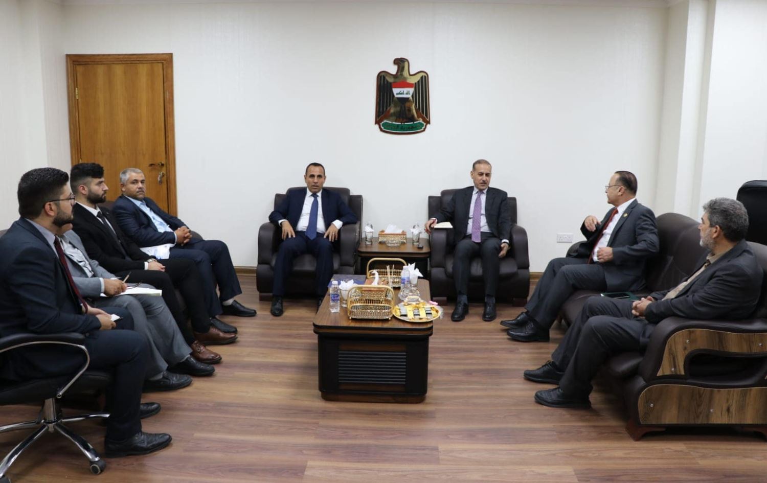 دیمەنی یەکێک لە کۆبوونەوەکانی شاندەکە لە بەغدا