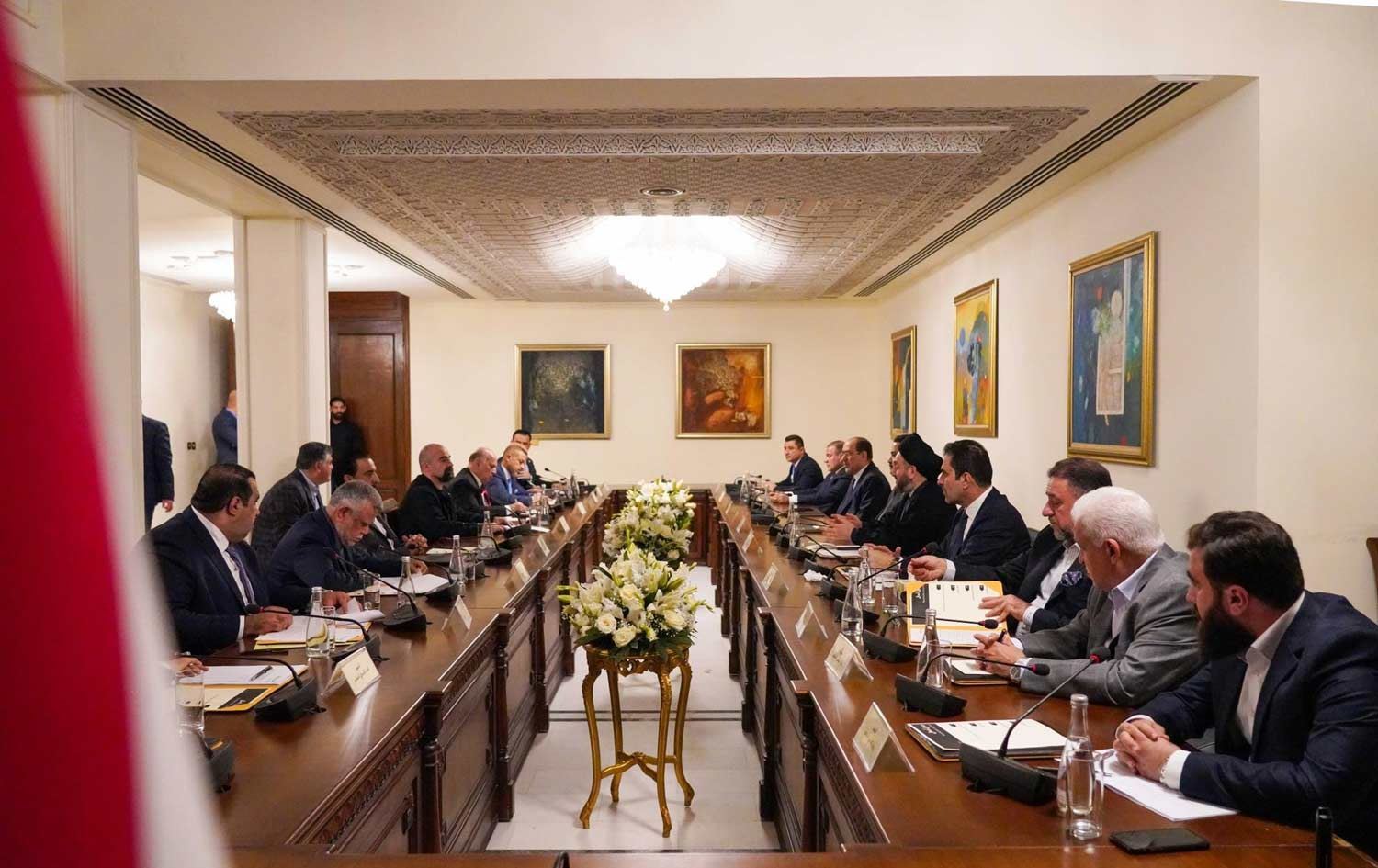 وێنەیەکی ئەرشیڤیی کۆبوونەوەیەکی هاوپەیمانیی بەڕێوەبردنی دەوڵەت لە ماڵی مام جەلال لە بەغدا 