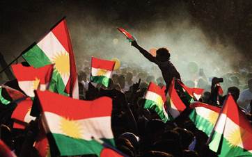 Kurds flying their flag during an event aimed to encourage people to vote in the independence referendum in Erbil. Date: September 15, 2017. Photo: AFP