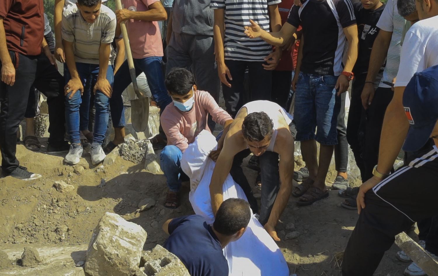 Distraught parents search for children under rubble in Gaza
