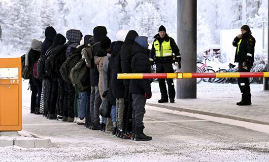 مهاجرون عالقون على الحدود الروسية - الفنلندية/ AFP