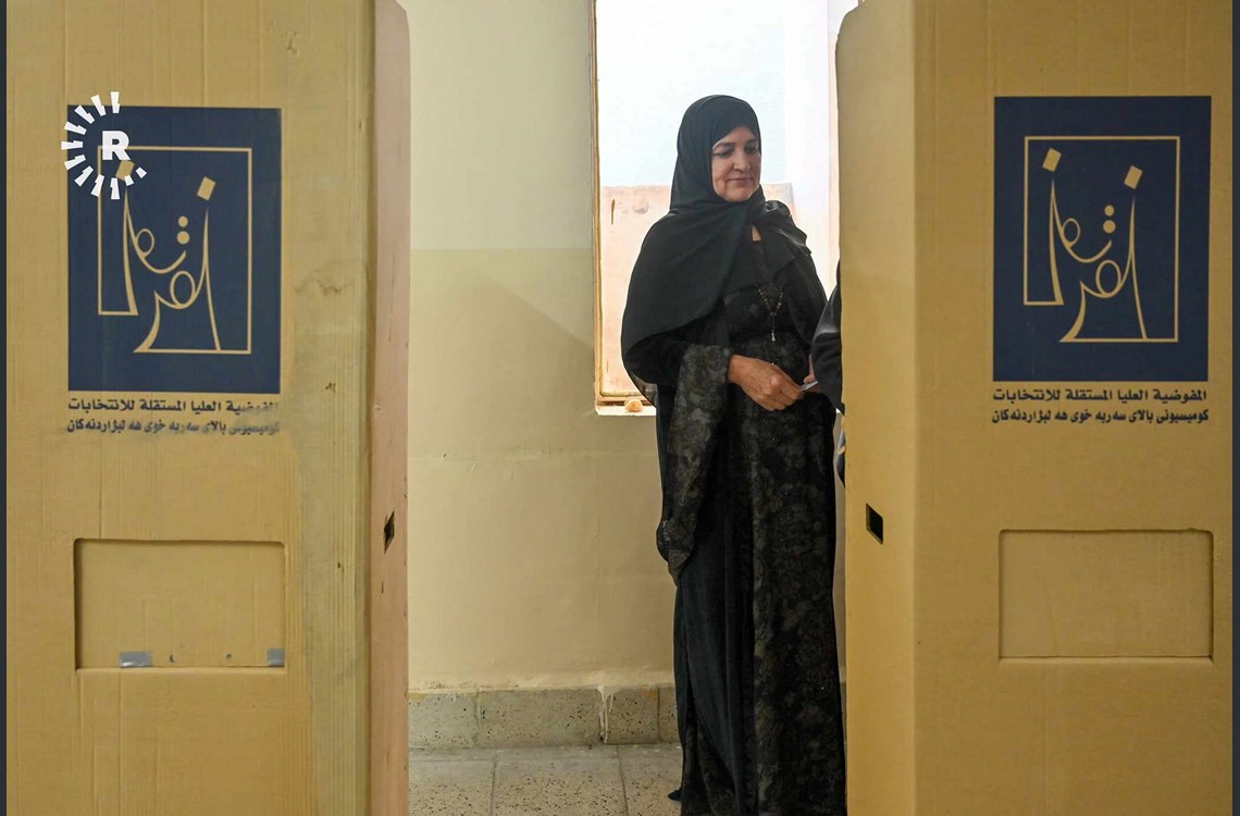 ژنێک لەکاتی دەنگدانی لە کەرکووک، وێنە: بڵند تاهیر - رووداو