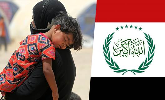 علم الاقليم العربي المقترح ونازحة تحمل طفلها