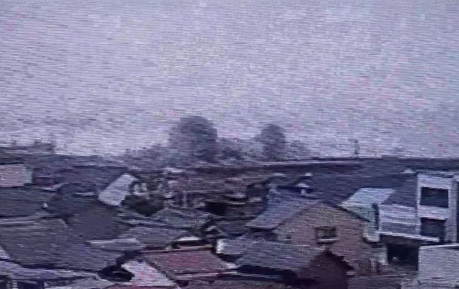 دیمەنی تسۆنامییەکە لە کامێرای چاودێرییەوە