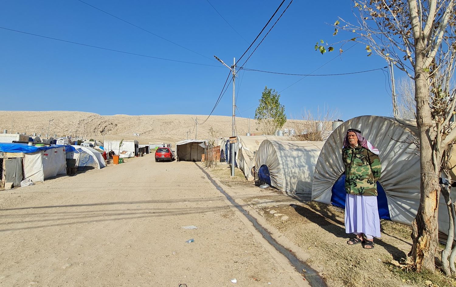 پیاوێک لە کەمپێکی ئاوارەکان لە هەرێمی کوردستان، وێنە: بڵند تاهیر - رووداو 