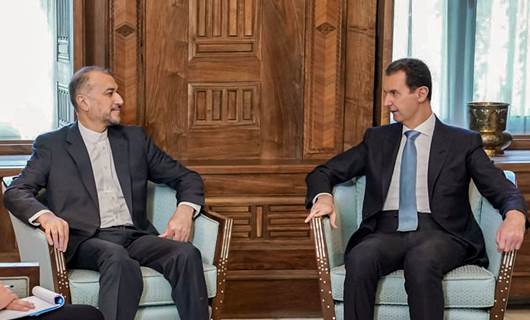 İran Dışişleri Bakanı Abdullahiyan (solda) ile Suriye Devlet Başkanı Beşar Esad / AFP