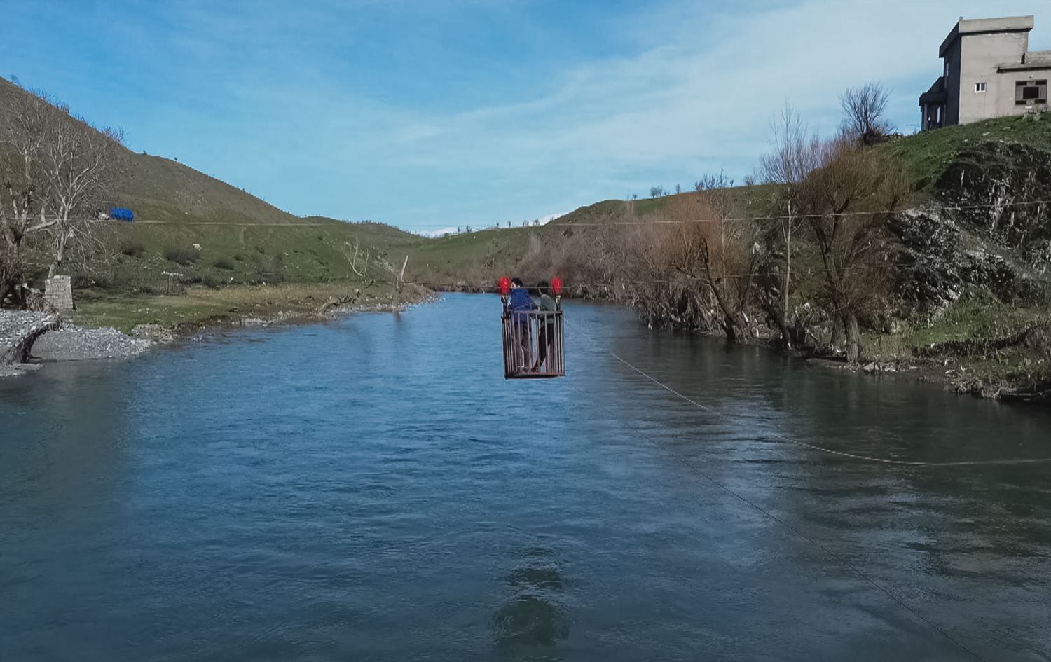Erbil villagers commute by cable car after torrential rain destroyed bridges