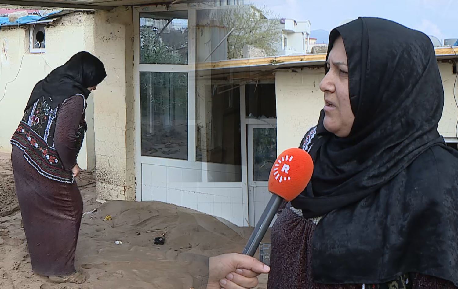 چیرۆکەکانی دوای لافاوەکەی دهۆک؛ ماڵی ژنە شەهیدێک بە بەرزیی مەترێک قوڕ و لیتەی تێچووە