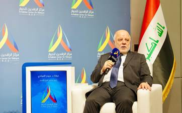 Haider al-Abadi speaking at a panel in Baghdad on March 26, 2024. Photo: RCD 