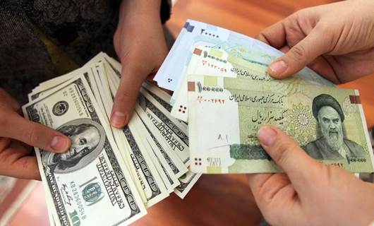 Iranians try to secure assets as currency value falls again
