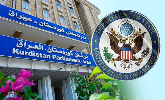شعار وزارة الخارجية الأميركية ومبنى برلمان كوردستان