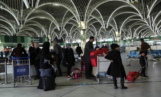 مسافرون عراقيون