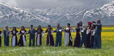 Kurdish boys and girls perform traditional dance in Gever on May 7, 2024. Photo: Rudaw 