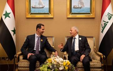 الرئيس العراقي عبد اللطيف رشيد ونظيره السوري بشار الأسد 