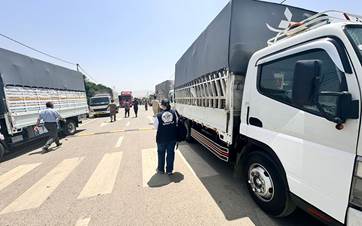 Trucks loaded with goods preparing for the return of the IDPs to their home towns on May 30, 2024. Photo: Iraqi migration ministry