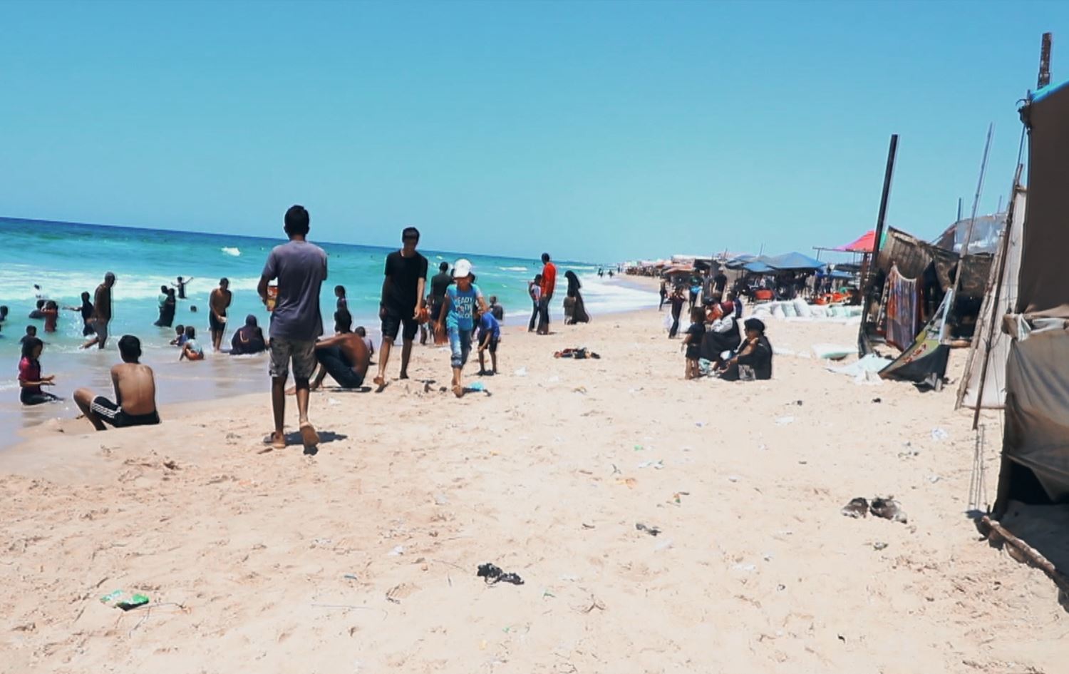 Gaza’s displaced find solace in the sea