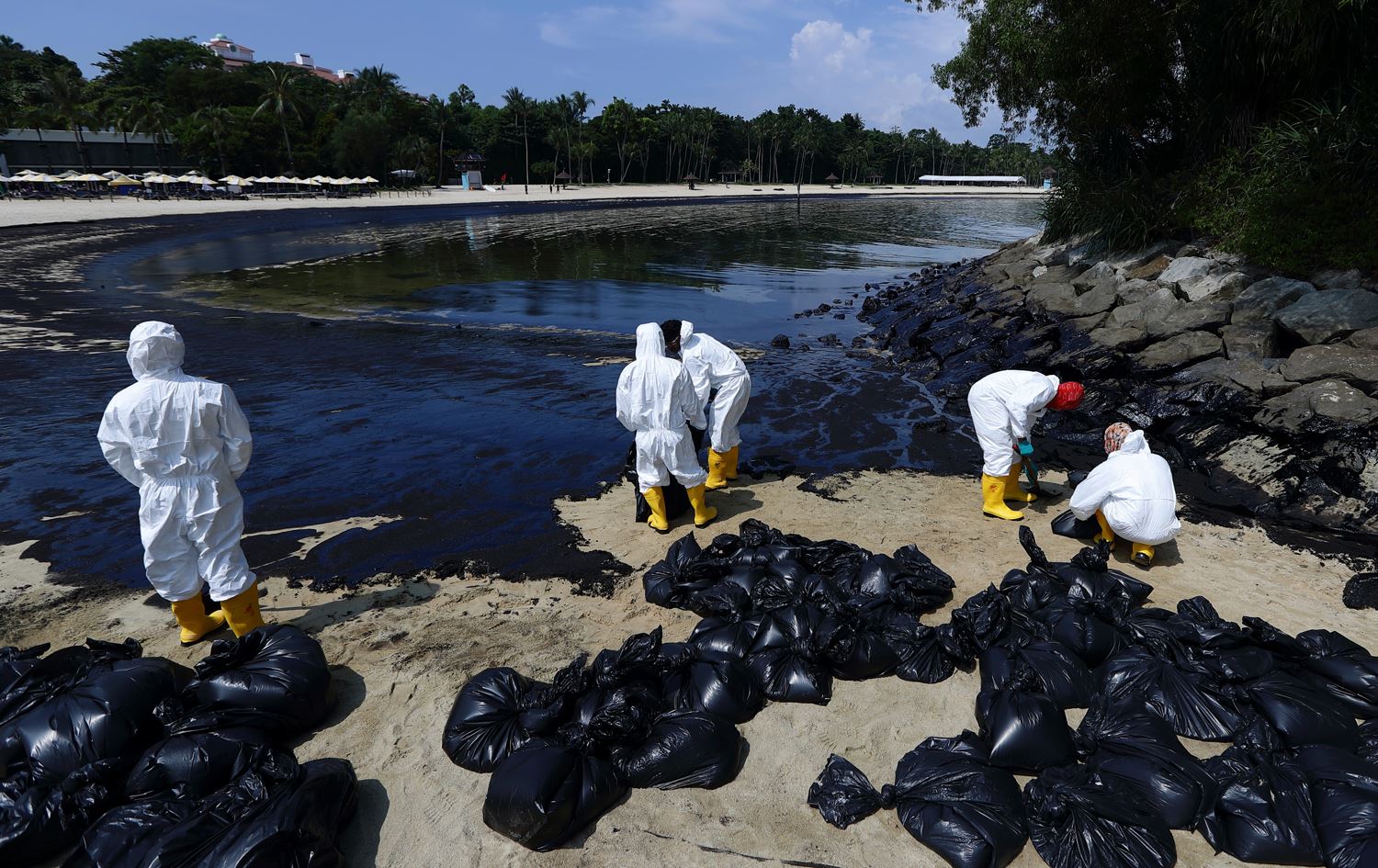 Four boys drown in Basra oil spill pit