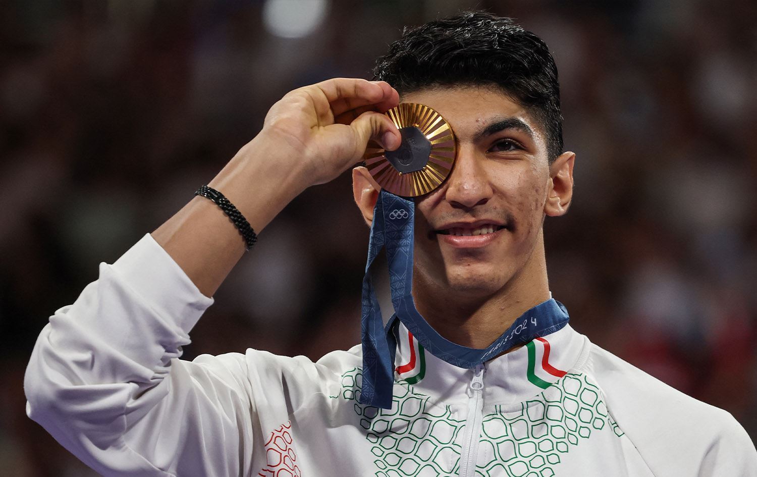 Aryen Selîmî maladyaya zêrîn stand/ Wêne: Davis Gray- AFP